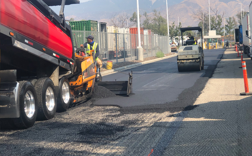 Solo worker driving small steam roller