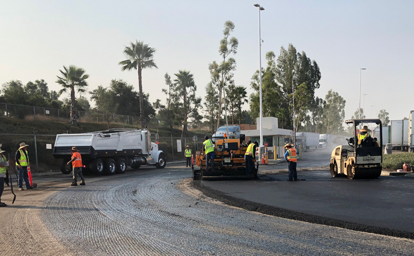 Construction team paving cement